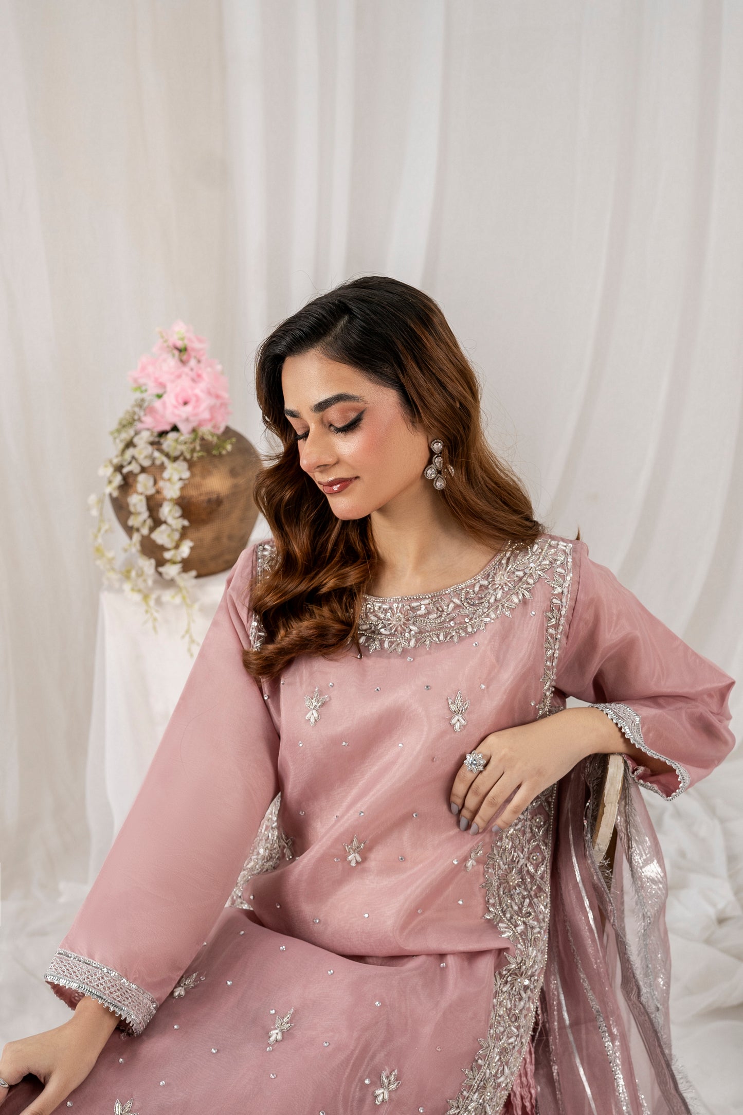 Elegant mauve pink 3-piece organza sharara set featuring intricate embroidery, a Kattan silk sharara, and a delicately adorned organza dupatta – perfect for wedding guests, festive occasions, and formal wear.